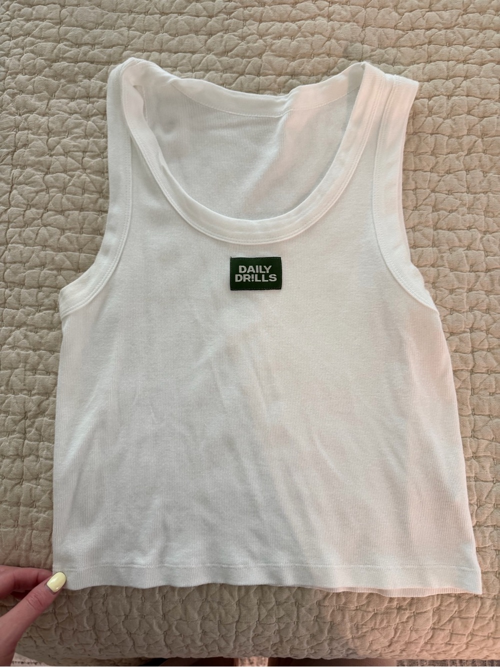 White daily drills tank